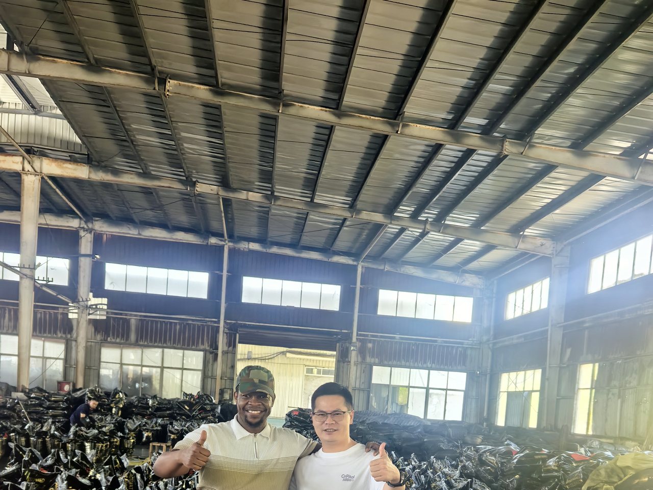 YELI Carbon team with a customer during a factory visit